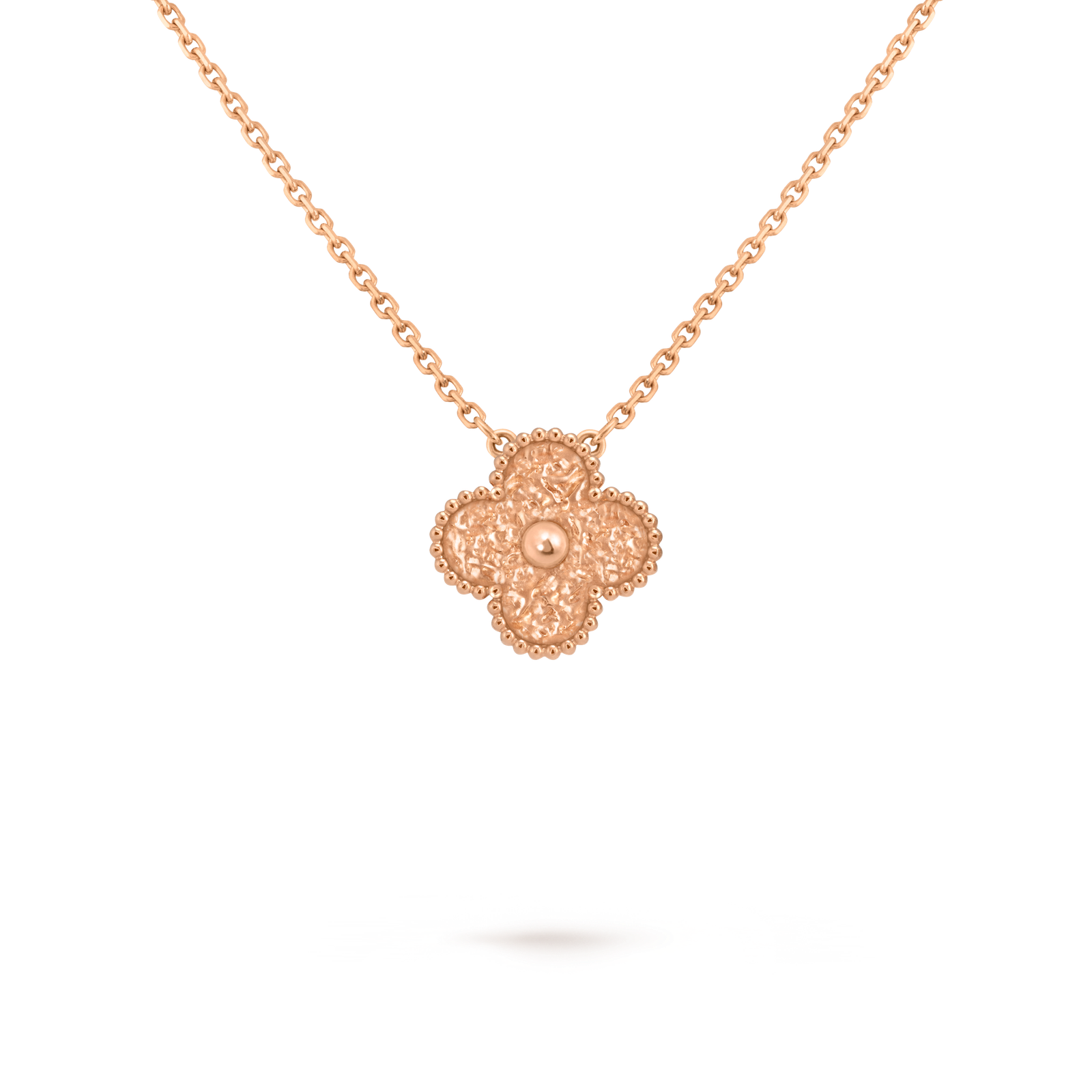 A single four-leaf clover necklace with guilloché floral carving technique in 18k rose gold. A single four-leaf clover necklace with guilloché floral carving technique in 18k rose gold.
