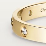 18k gold 10 diamond screw motif bangle bracelet