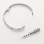 18k white gold diamond pave screw motif bangle bracelet