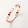 18K rose gold screw motif bangle bracelet