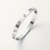 18K White Gold Screw Motif Bangle Bracelet