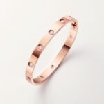 18k rose gold 10 diamond screw motif bangle bracelet