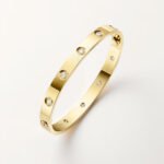 18k gold 10 diamond screw motif bangle bracelet