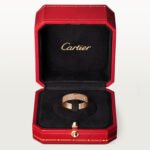 Shop our 18K gold pavé diamond screw ring. This luxury minimalist gold band features brilliant pavé detailing and modern architectural design.