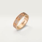 Shop our 18K gold pavé diamond screw ring. This luxury minimalist gold band features brilliant pavé detailing and modern architectural design.