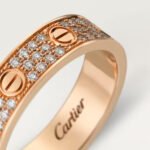 Shop our 18K gold pavé diamond screw ring. This luxury minimalist gold band features brilliant pavé detailing and modern architectural design.
