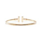 yellow gold mother of pearl T bangle bracelet
