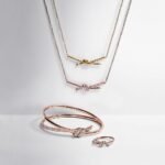 yellow gold knot pendant necklace