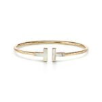 yellow gold mother of pearl T bangle bracelet