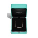 two-tone pave diamond knot necklace