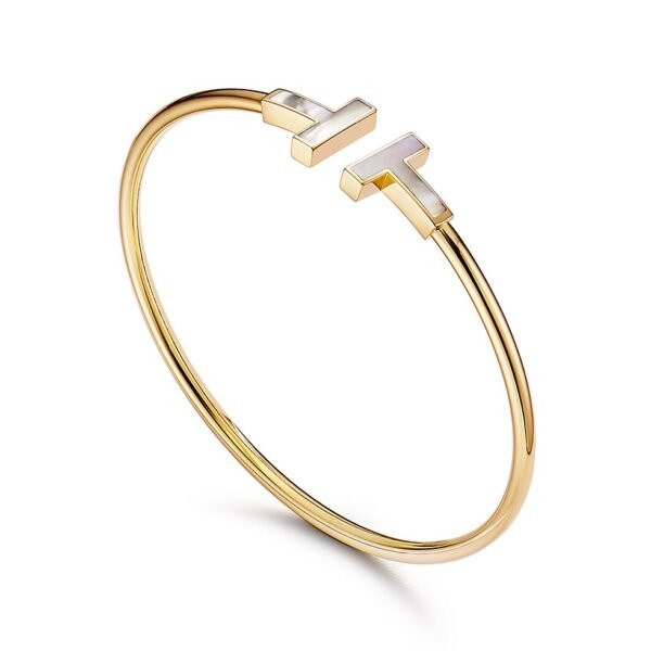yellow gold mother of pearl T bangle bracelet